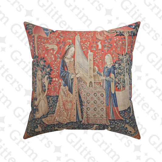 Elevate your decor with the enchanting Lady and the Unicorn (Hearing) Square Pillow from Grim Glitters. Inspired by the iconic Unicorn Tapestry, this pillow brings historical charm and mystical allure to any room. Crafted from eco-friendly materials for p