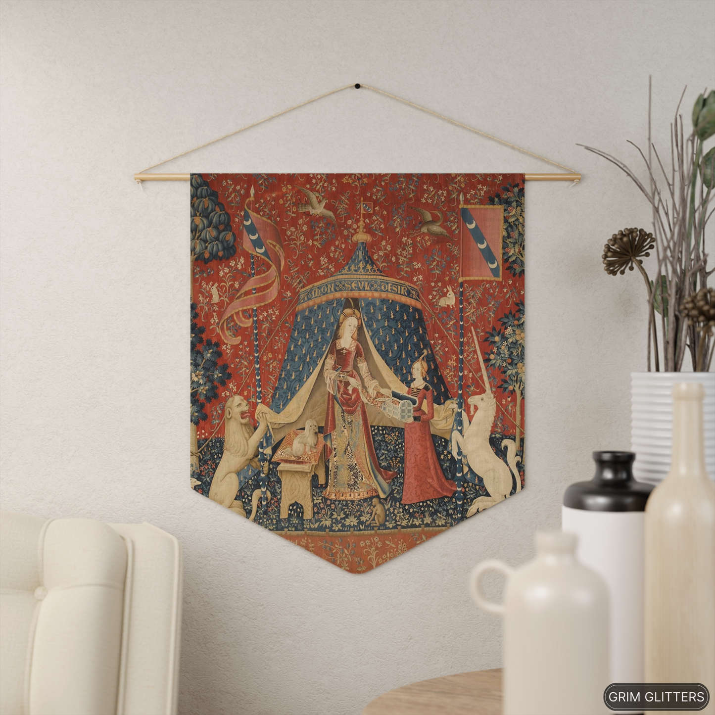 Add a touch of medieval magic to your decor with The Lady and the Unicorn (Desire) Pennant Banner from Grim Glitters. This beautiful banner, inspired by the iconic Unicorn Tapestries, brings historical charm and fantasy allure to any space.