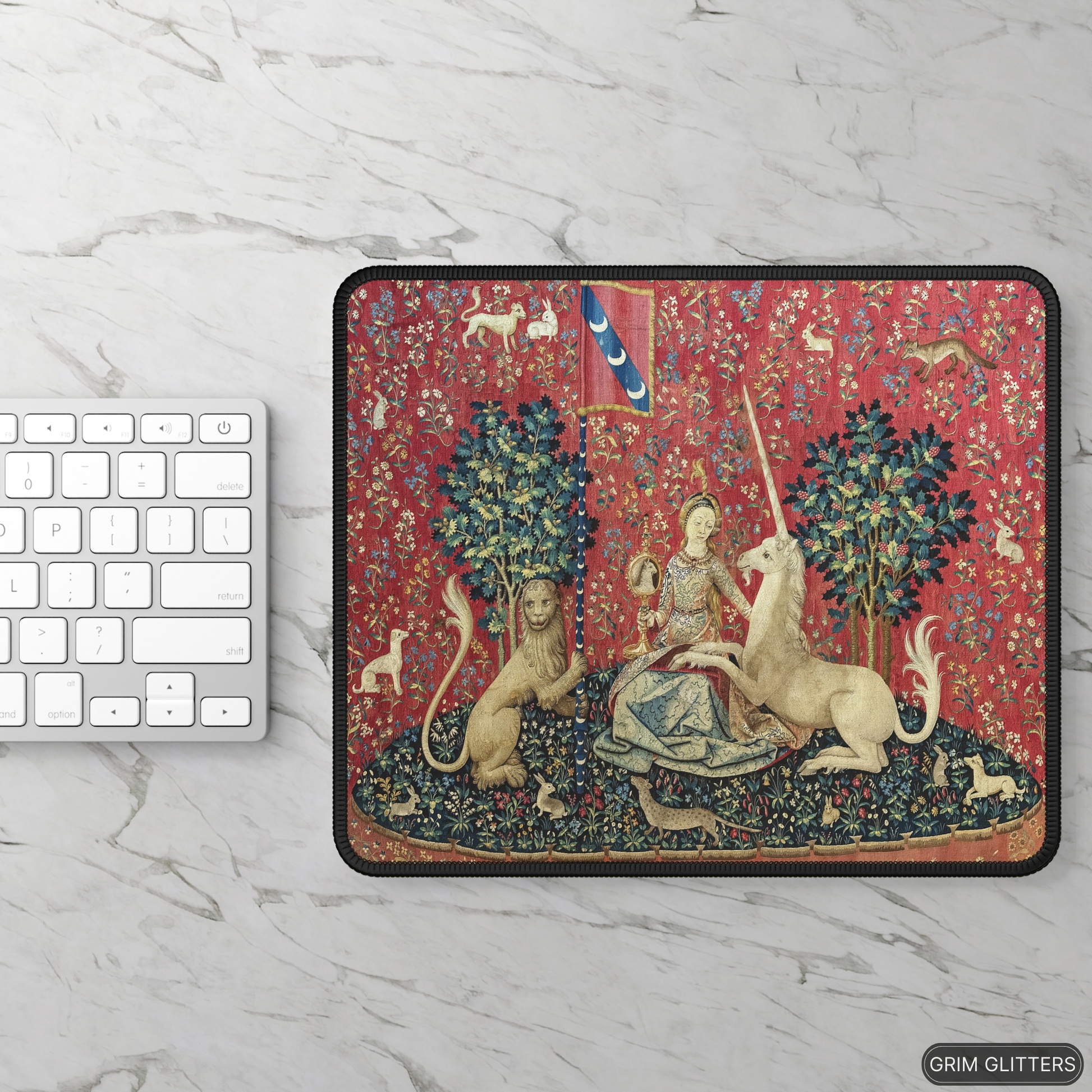 Enhance your gaming experience with the enchanting elegance of The Lady and the Unicorn (Sight) Gaming Mouse Pad from Grim Glitters. Inspired by the iconic medieval tapestry, this mouse pad combines historical charm with modern functionality.