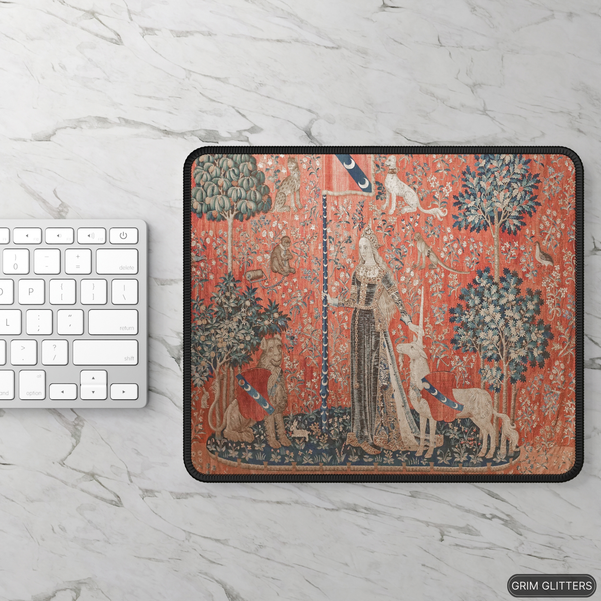 Enhance your gaming experience with the enchanting elegance of The Lady and the Unicorn (Touch) Gaming Mouse Pad from Grim Glitters. Inspired by the iconic medieval tapestry, this mouse pad combines historical charm with modern functionality, making it a