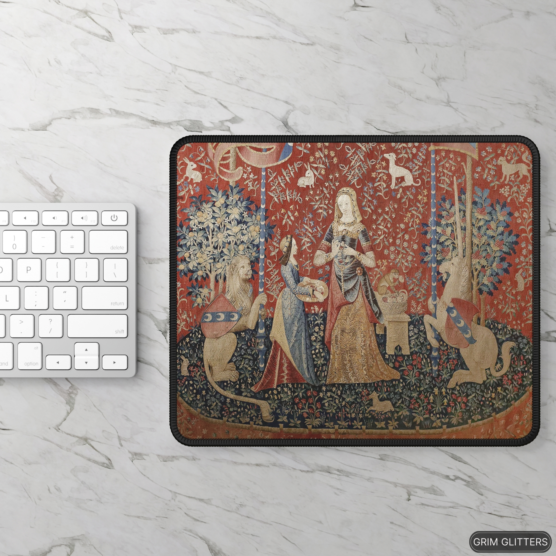 Enhance your gaming experience with the Lady and the Unicorn (Smell) Gaming Mouse Pad from Grim Glitters. Inspired by the iconic medieval tapestry, this mouse pad combines historical charm with modern functionality for a magical addition to any desk.