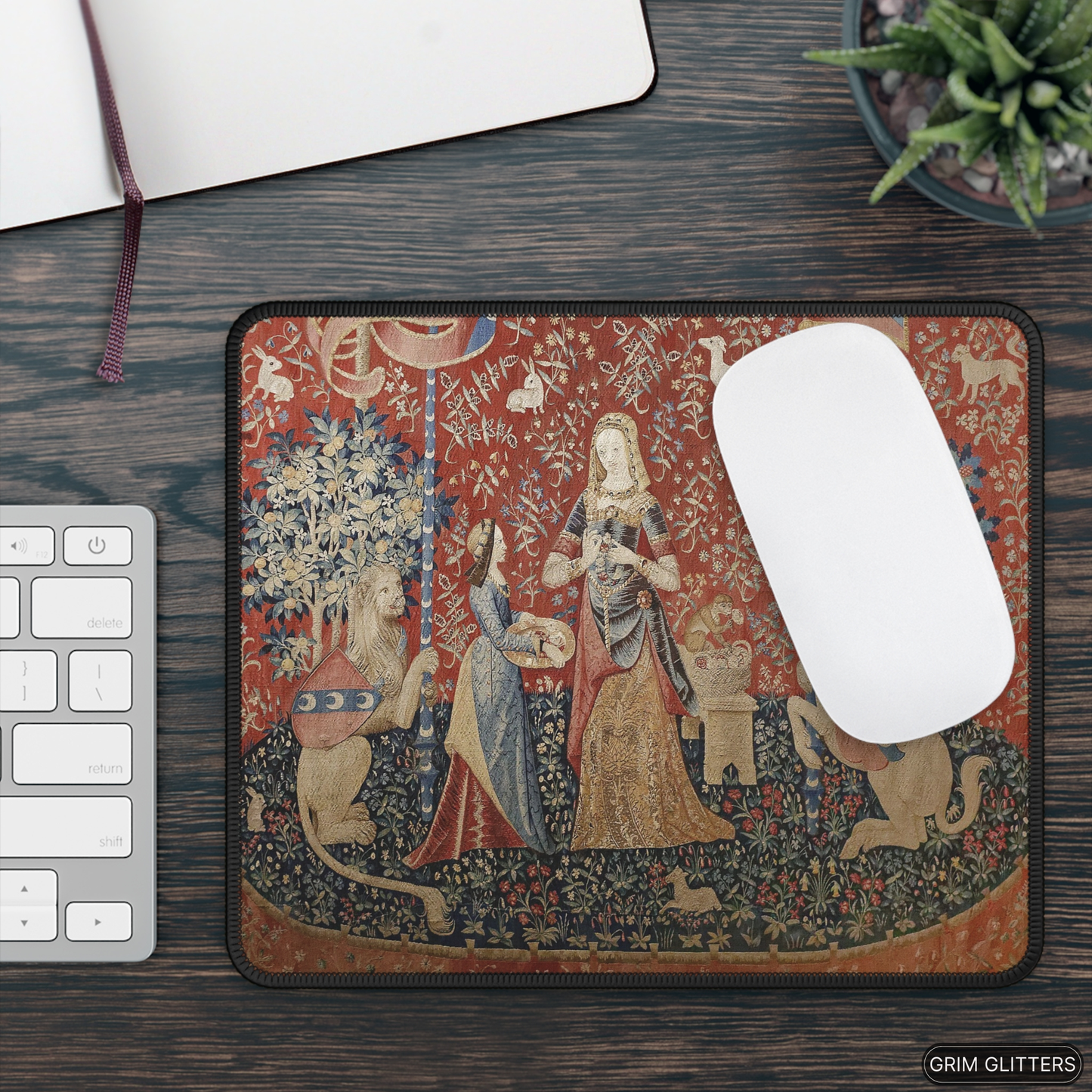 Enhance your gaming experience with the Lady and the Unicorn (Smell) Gaming Mouse Pad from Grim Glitters. Inspired by the iconic medieval tapestry, this mouse pad combines historical charm with modern functionality for a magical addition to any desk.