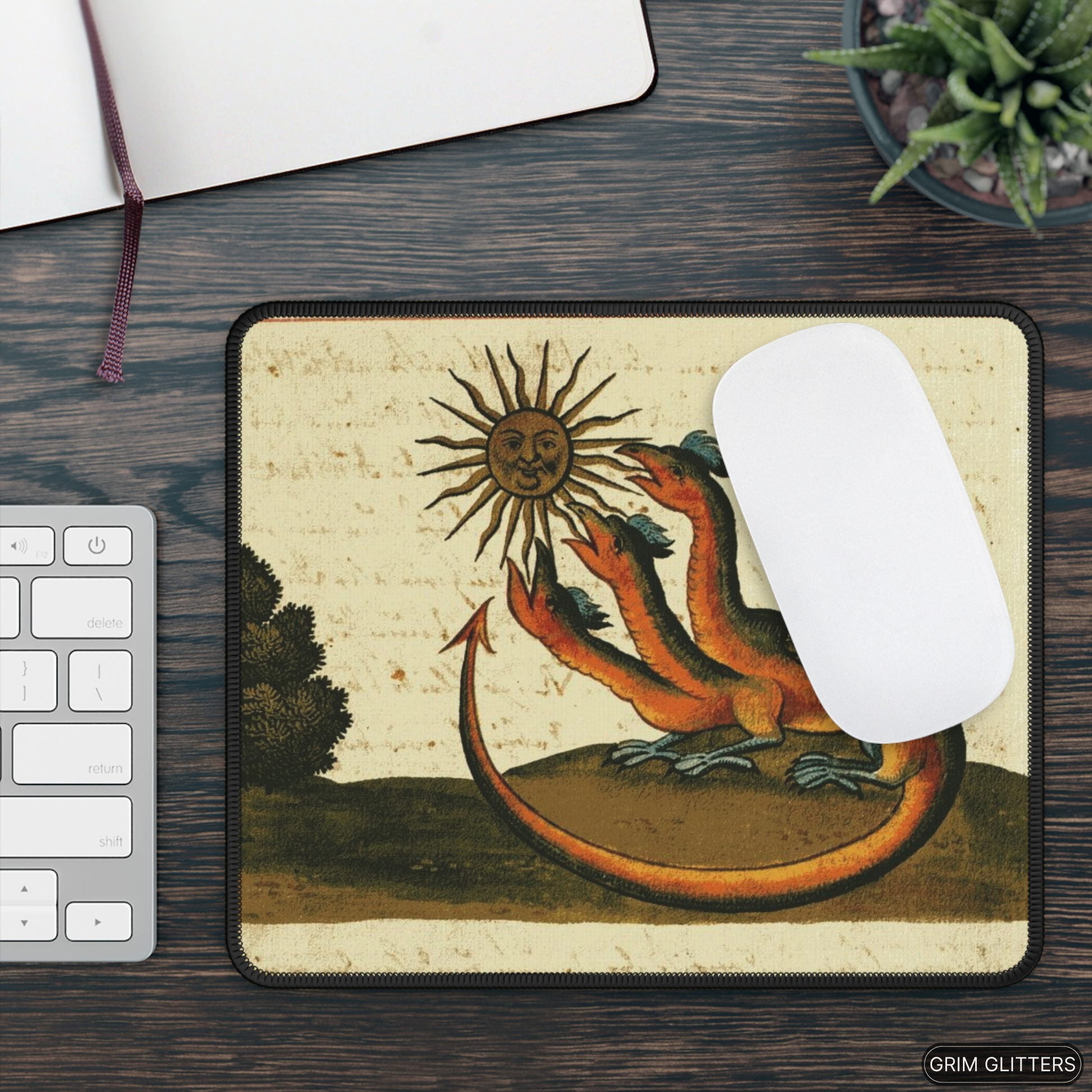 Enhance your gaming setup with the mystical Three-Headed Dragon Gaming Mouse Pad from Grim Glitters. Inspired by the Clavis Artis manuscript, this mouse pad features a captivating three-headed dragon design, blending alchemical symbolism with modern funct