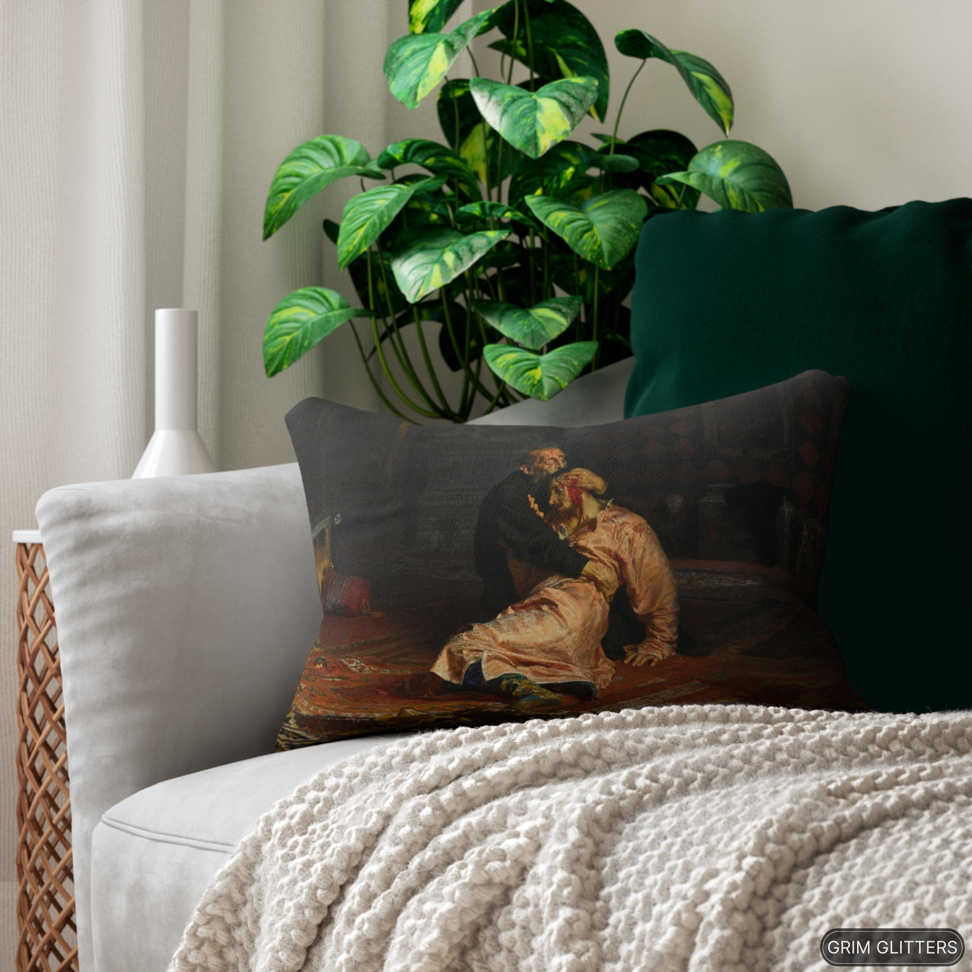 Lumbar pillow featuring Ilya Repin's painting of Ivan the Terrible and his son, placed on a cozy sofa with a green cushion and blanket.