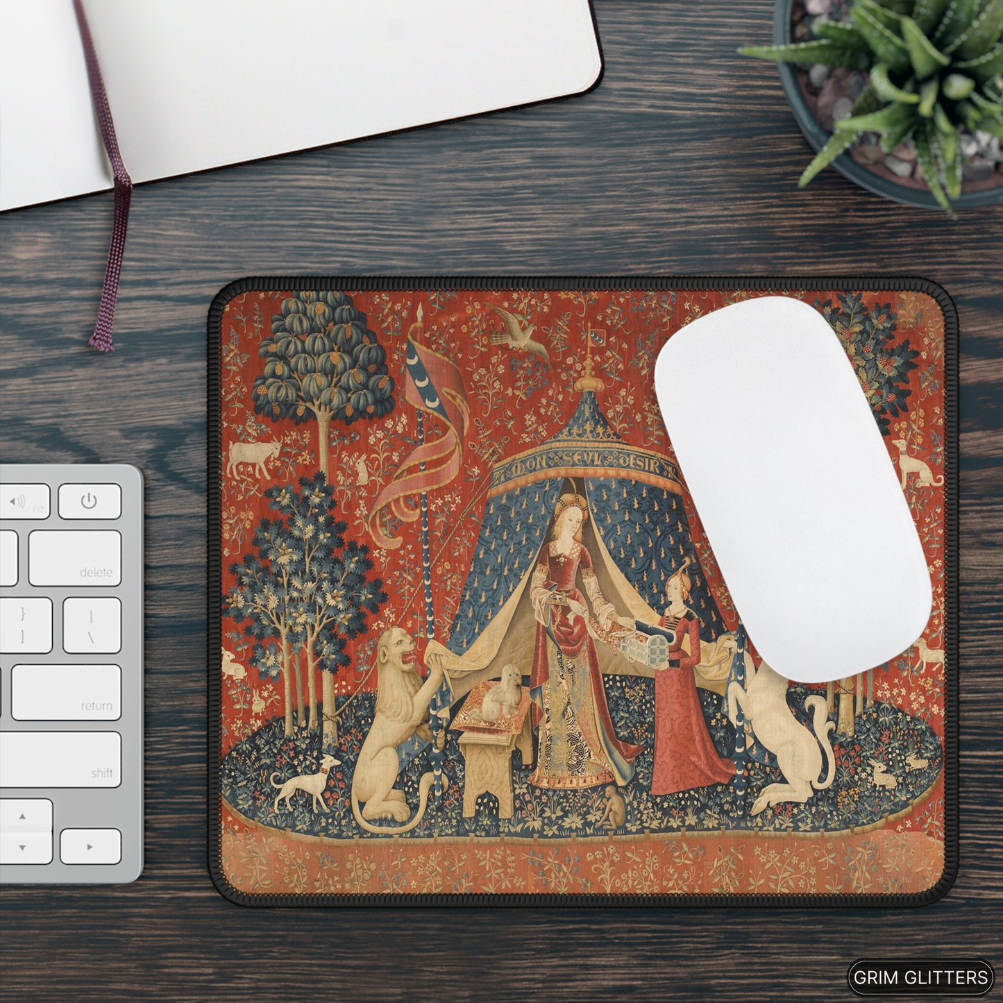 Enhance your gaming experience with the enchanting Lady and the Unicorn (Desire) Gaming Mouse Pad from Grim Glitters. Featuring the iconic medieval tapestry, this mouse pad combines historical charm with modern functionality, adding a touch of elegance to