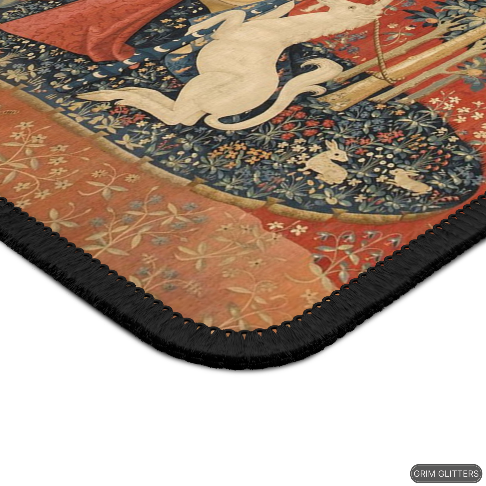 Enhance your gaming experience with the enchanting Lady and the Unicorn (Desire) Gaming Mouse Pad from Grim Glitters. Featuring the iconic medieval tapestry, this mouse pad combines historical charm with modern functionality, adding a touch of elegance to