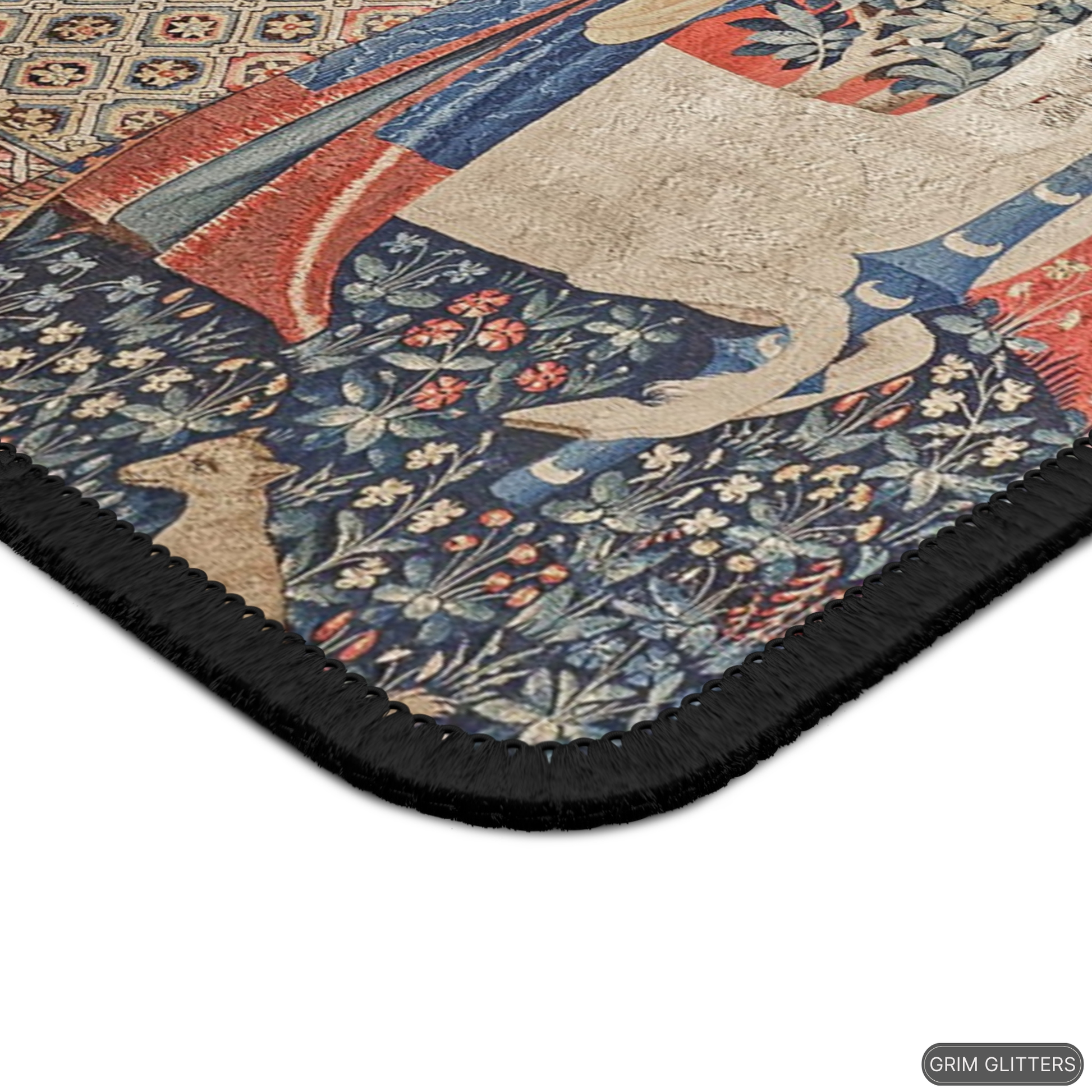 Enhance your gaming experience with the enchanting Lady and the Unicorn (Hearing) Gaming Mouse Pad from Grim Glitters. Inspired by the iconic medieval tapestry, this mouse pad combines historical charm with modern functionality, adding a touch of elegance