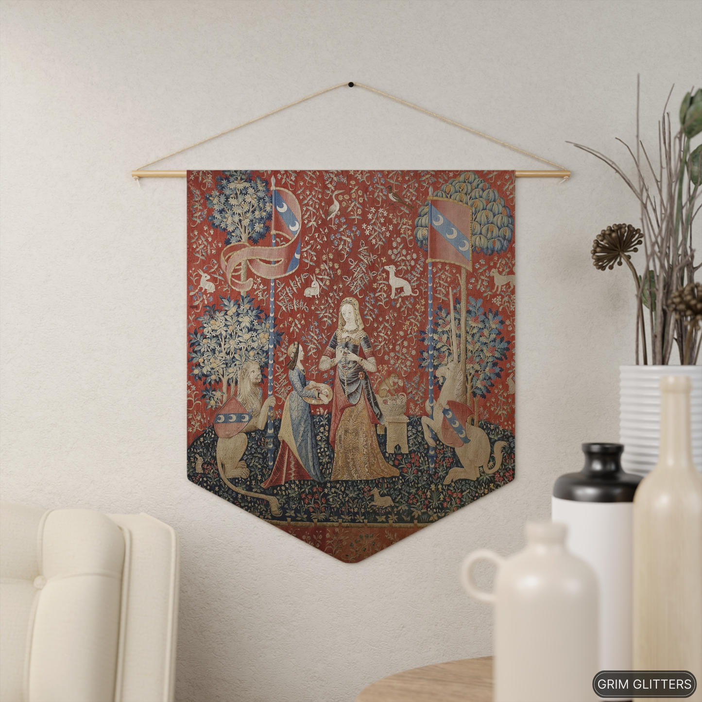 Step into the enchanting world of medieval art with The Lady and the Unicorn (Smell) Pennant Banner from Grim Glitters. This exquisite banner captures the essence of mystery and magic, perfect for adding a touch of historical charm to any space.