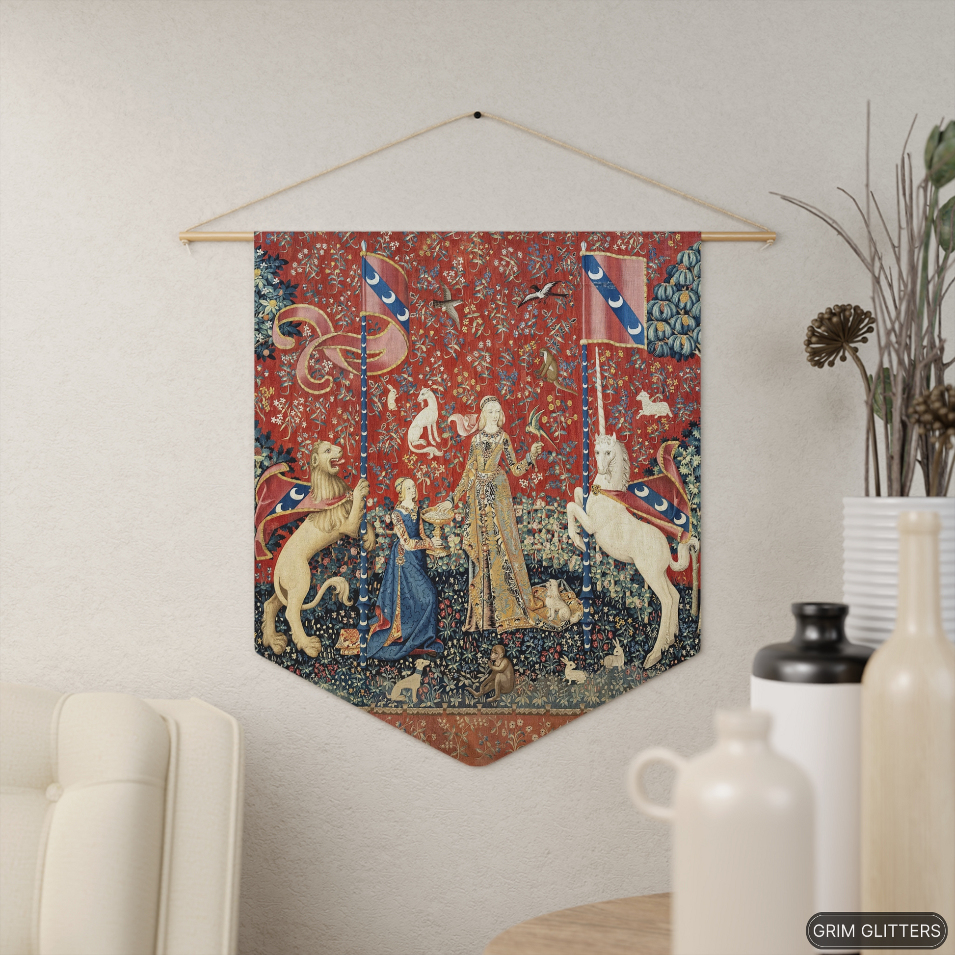 Step into the enchanting world of medieval art with The Lady and the Unicorn (Taste) Pennant Banner from Grim Glitters. This exquisite banner captures the essence of mystery and magic, perfect for adding a touch of historical charm to any space.