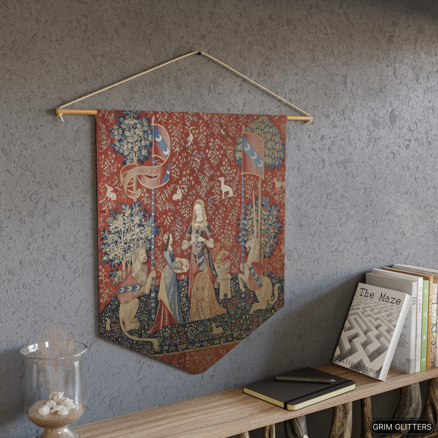 Step into the enchanting world of medieval art with The Lady and the Unicorn (Smell) Pennant Banner from Grim Glitters. This exquisite banner captures the essence of mystery and magic, perfect for adding a touch of historical charm to any space.