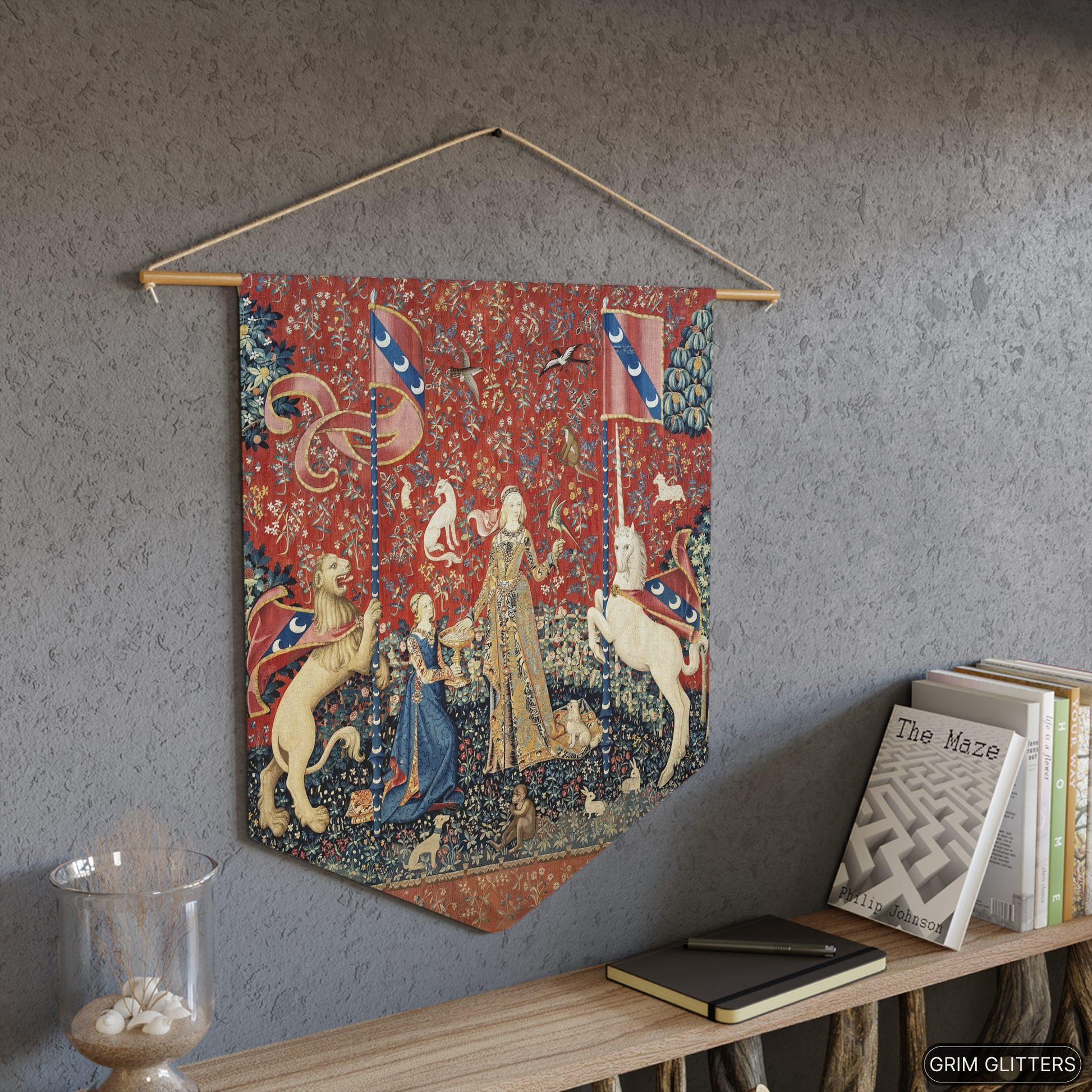 Step into the enchanting world of medieval art with The Lady and the Unicorn (Taste) Pennant Banner from Grim Glitters. This exquisite banner captures the essence of mystery and magic, perfect for adding a touch of historical charm to any space.